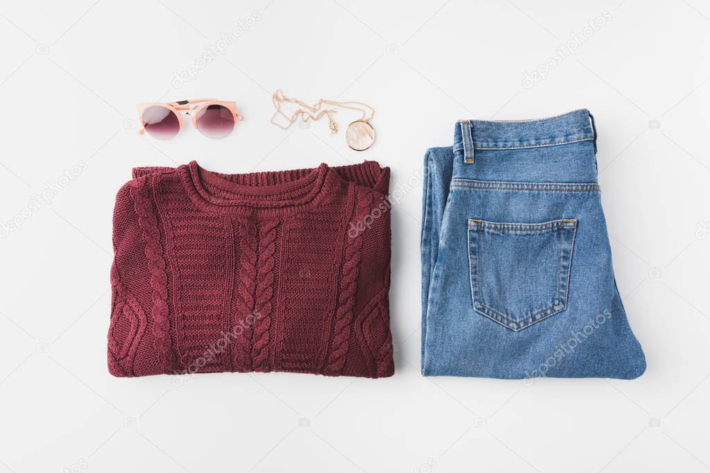 knitted sweater and trendy jeans