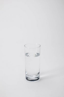 transparent glass with calm water on white clipart