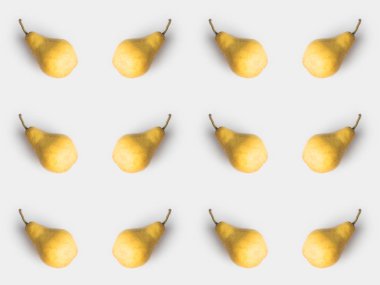 pattern of fresh yellow pears isolated on white clipart