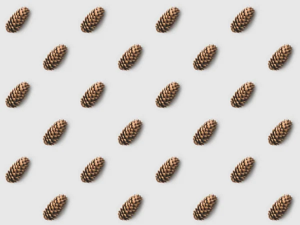 Repetitive Pattern Pine Cones White Surface — Stock Photo, Image