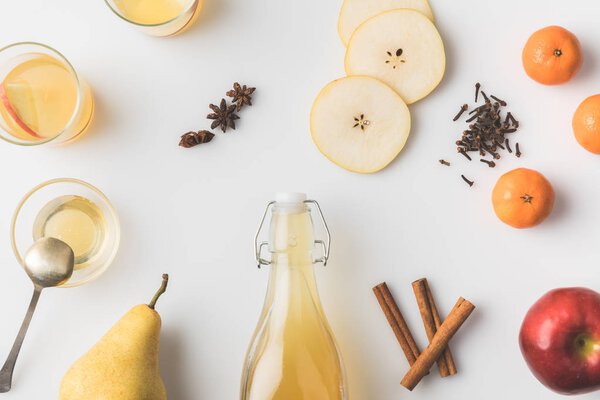 top view of delicious cider composition on white tabletop