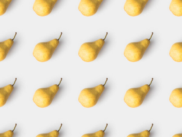 повторяющийся рисунок желтых груш, изолированных на белом
