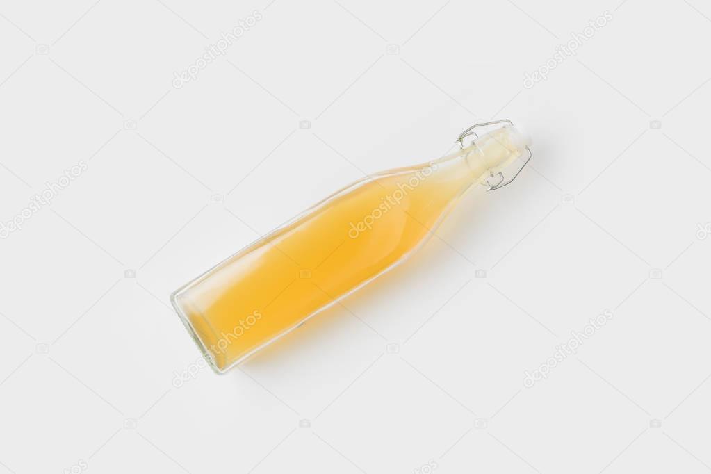 bottle of refreshing apple cider isolated on white