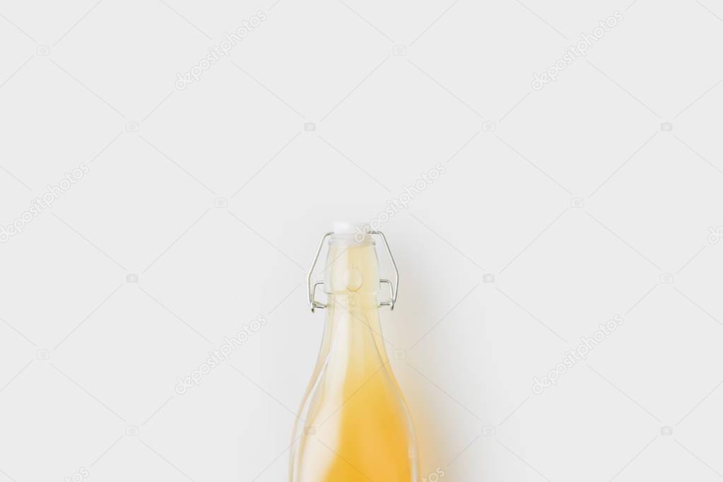 bottle of delicious apple cider isolated on white