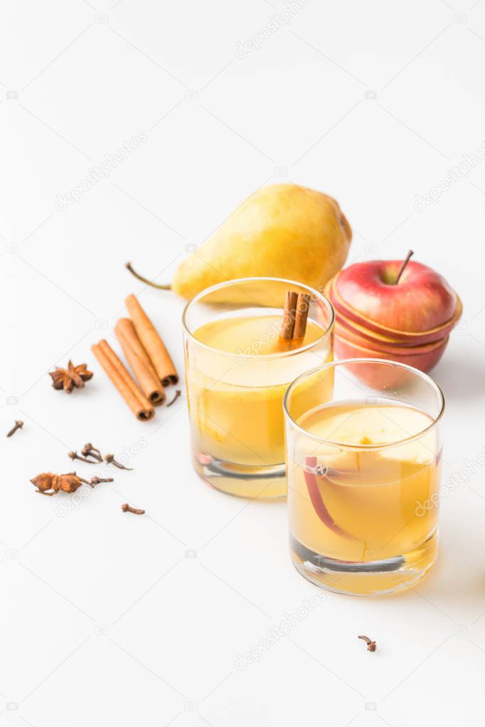 glasses of delicious spiced cider with pear and apple