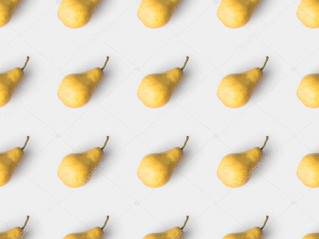 repetitive pattern of yellow pears isolated on white