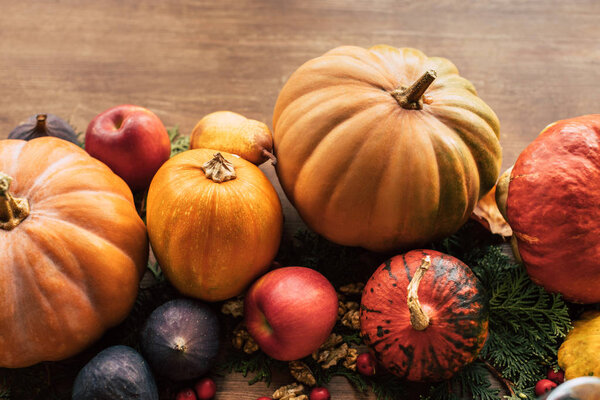 Composition of various autumn fruits and vegetables as holiday table decor