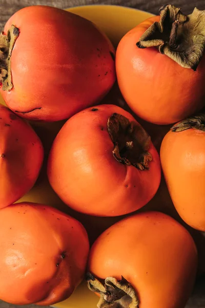Top View Ripe Orange Persimmons Plate — Stock Photo, Image