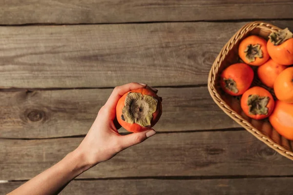 Cropped Image Woman Holding Persimmon — Stock Photo, Image