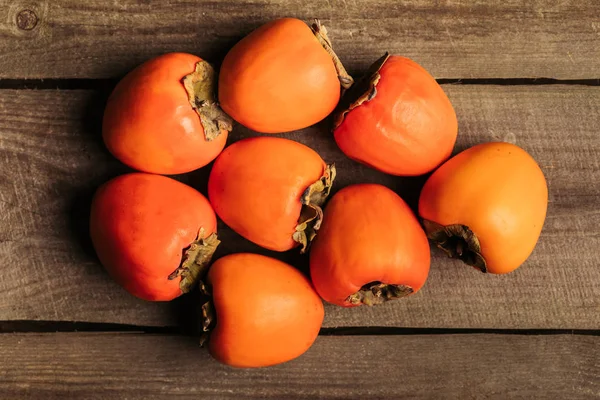 Top View Ripe Persimmons Wooden Table — Stock Photo, Image