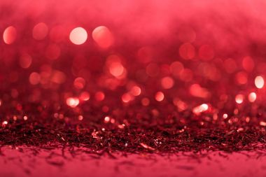 christmas background with red shiny blurred confetti  clipart