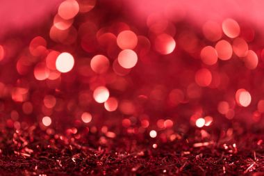 christmas background with red shiny confetti with bokeh clipart