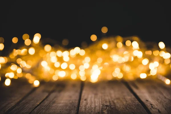 Christmas Bokeh Lights Wooden Surface — Stock Photo, Image