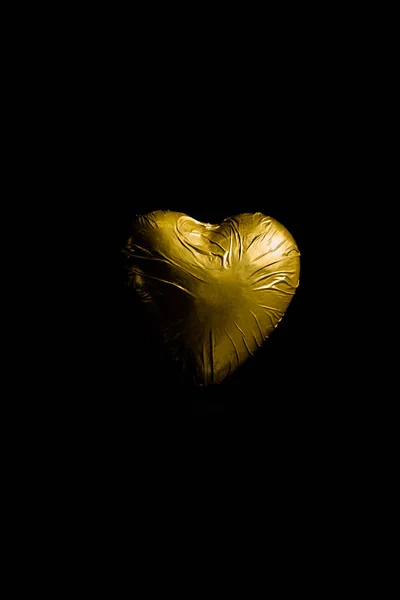 Heart Shaped Candy Golden Wrapper Isolated Black — Stock Photo, Image