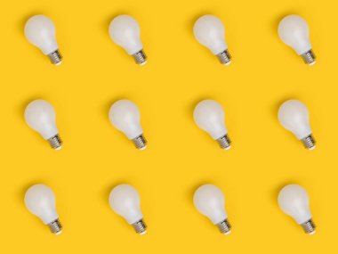 full frame of arrangement of light bulbs isolated on yellow clipart