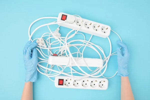 Partial View Female Hands Protective Gloves Extension Cords Isolated Blue — Stock Photo, Image
