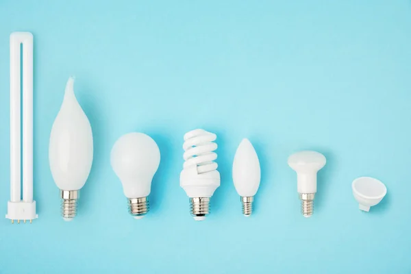 Flat Lay Arranged Various Light Bulbs Isolated Blue — Stock Photo, Image