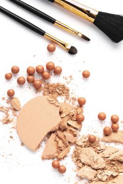 crushed nude cosmetic powder isolated on white clipart