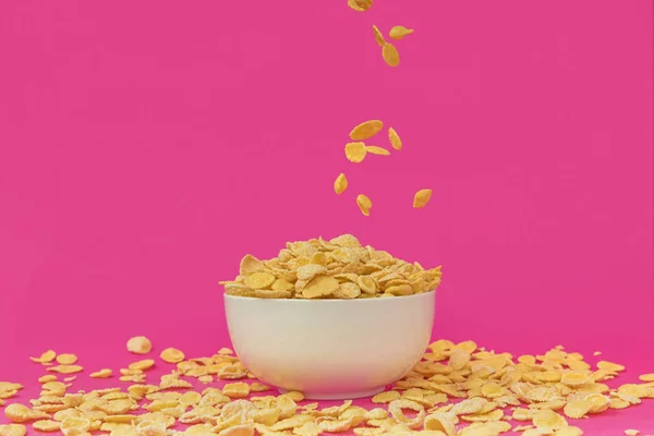 Close View Sweet Healthy Corn Flakes Falling White Bowl Pink — Stock Photo, Image