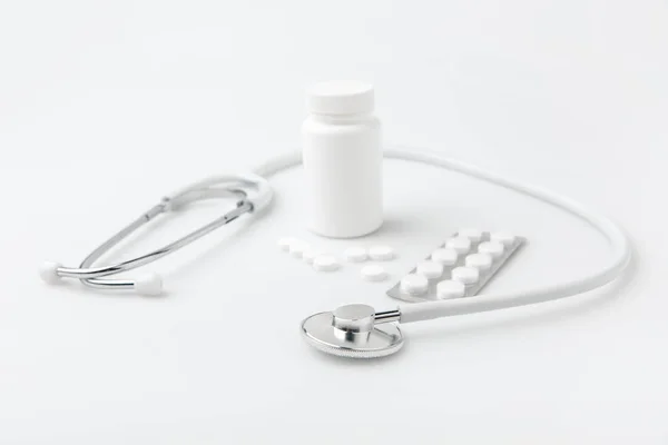 Stethoscope Scattered Pills Another Tablets Package Plastic Can Isolated White — Stock Photo, Image