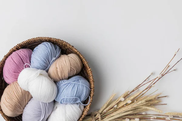 Top View Colored Yarn Balls Wicker Basket Dried Plants White — Stock Photo, Image