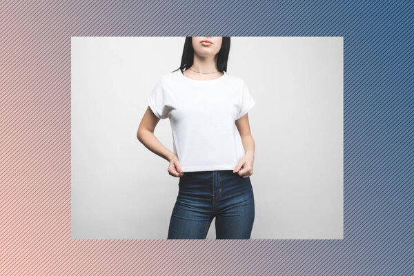 young woman in blank t-shirt on white with creative frame