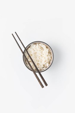 top view of bowl of freshly cooked rice with chopsticks isolated on white clipart