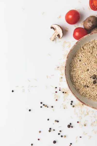 Top View Raw Rice Spices Bowl Mushrooms Tomatoes White Surface — Stock Photo, Image