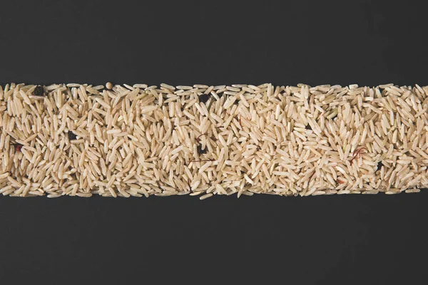 Top View Stripe Raw Rice Isolated Black — Stock Photo, Image