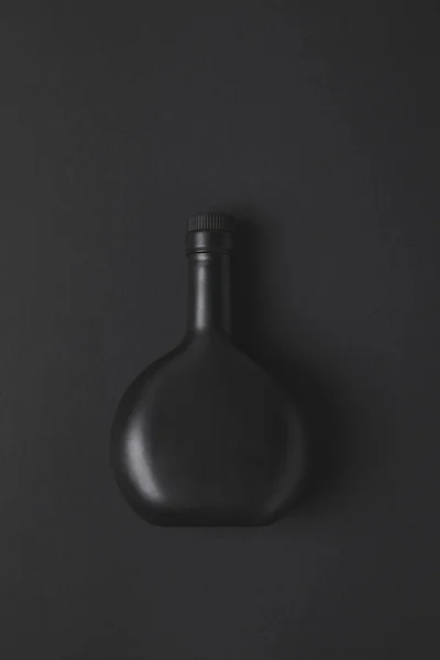 Top View Empty Bottle Black Surface — Stock Photo, Image