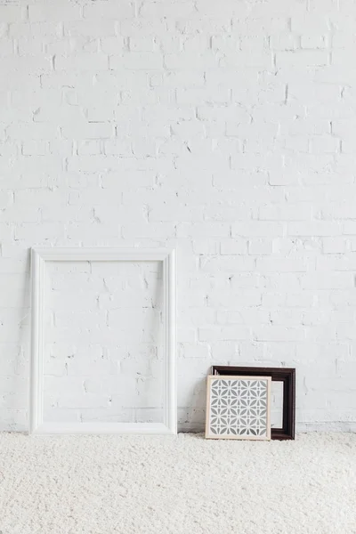 Picture Frames Leaning White Brick Wall Mockup Concept — Stock Photo, Image