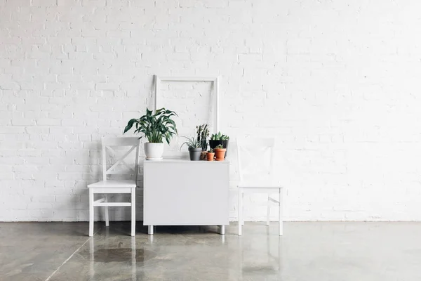 House decor in front of white brick wall, mockup concept — Stock Image House Decor Front White Brick Wall Mockup Concept Royalty Free Stock Photos