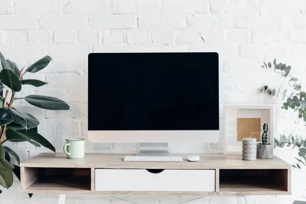 Blank copmuter screen on modern workplace surrounded with flower pots, mockup concept — Stock Image Blank Copmuter Screen Modern Workplace Surrounded Flower Pots Mockup Concept Stock Image