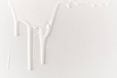 white dripping paint on white surface clipart