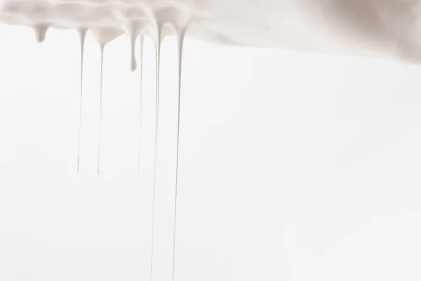 White Paint Flowing Isolated White — Free Stock Photo