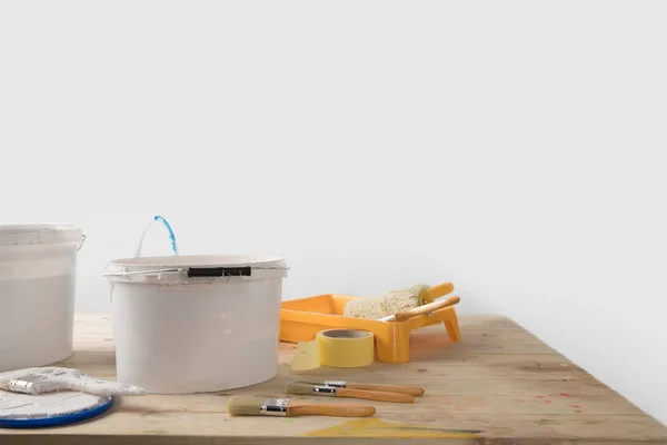 Buckets Paints Plastic Tray Wooden Table — Free Stock Photo