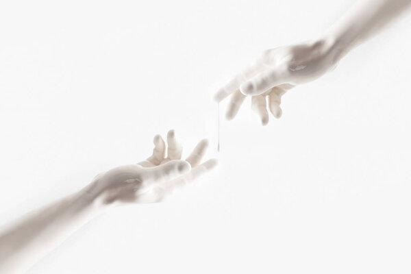 cropped image of woman and man reaching out with hands isolated on white