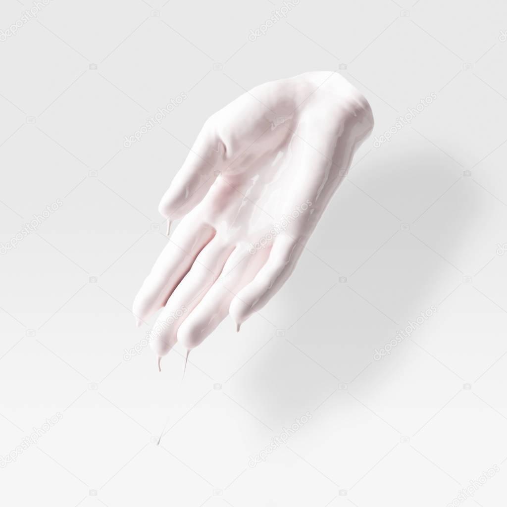 abstract sculpture in shape of human arm in white paint on white