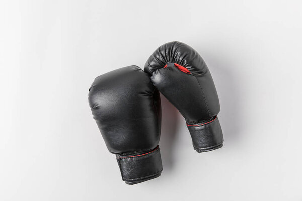 top view of boxing gloves on white tabletop