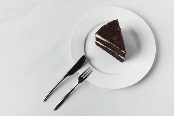 Chocolate Cake Plate Fork Knife White Surface — Stock Photo, Image