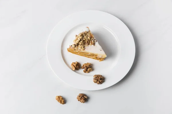 Cake Walnuts Plate Placed White Surface — Stock Photo, Image