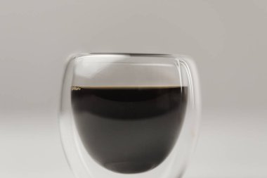 Double Walled Glass cup with espresso coffee on white background clipart