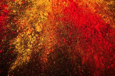 colorful holi powder explosion on black clipart