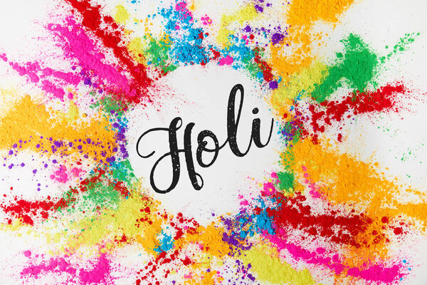 circle of colorful traditional powder with Holi sign, isolated on white, Hindu spring festival