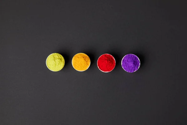 Top View Row Colorful Holi Paint Bowls Grey Surface — Stock Photo, Image