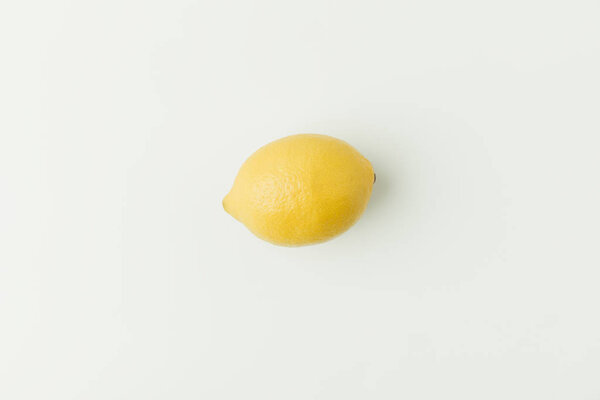 Ripe yellow lemon isolated on white background