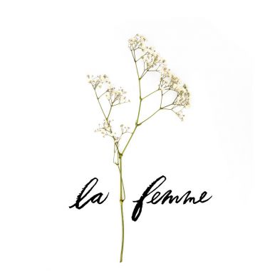 small white flowers on twig with LE FEMME lettering isolated on white clipart