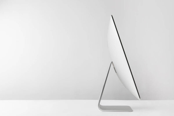 side view of modern desktop computer on white  