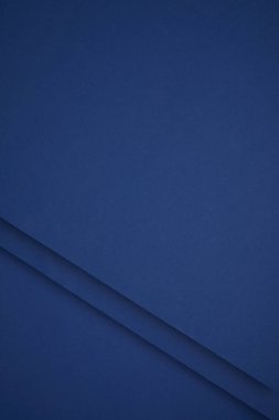dark blue abstract background from colored paper  clipart