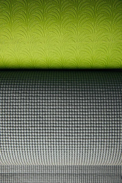 Top View Two Green Grey Rolled Yoga Mats — Free Stock Photo